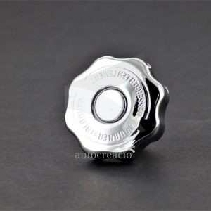 Tapón de agua cromado con válvula de seguridad.